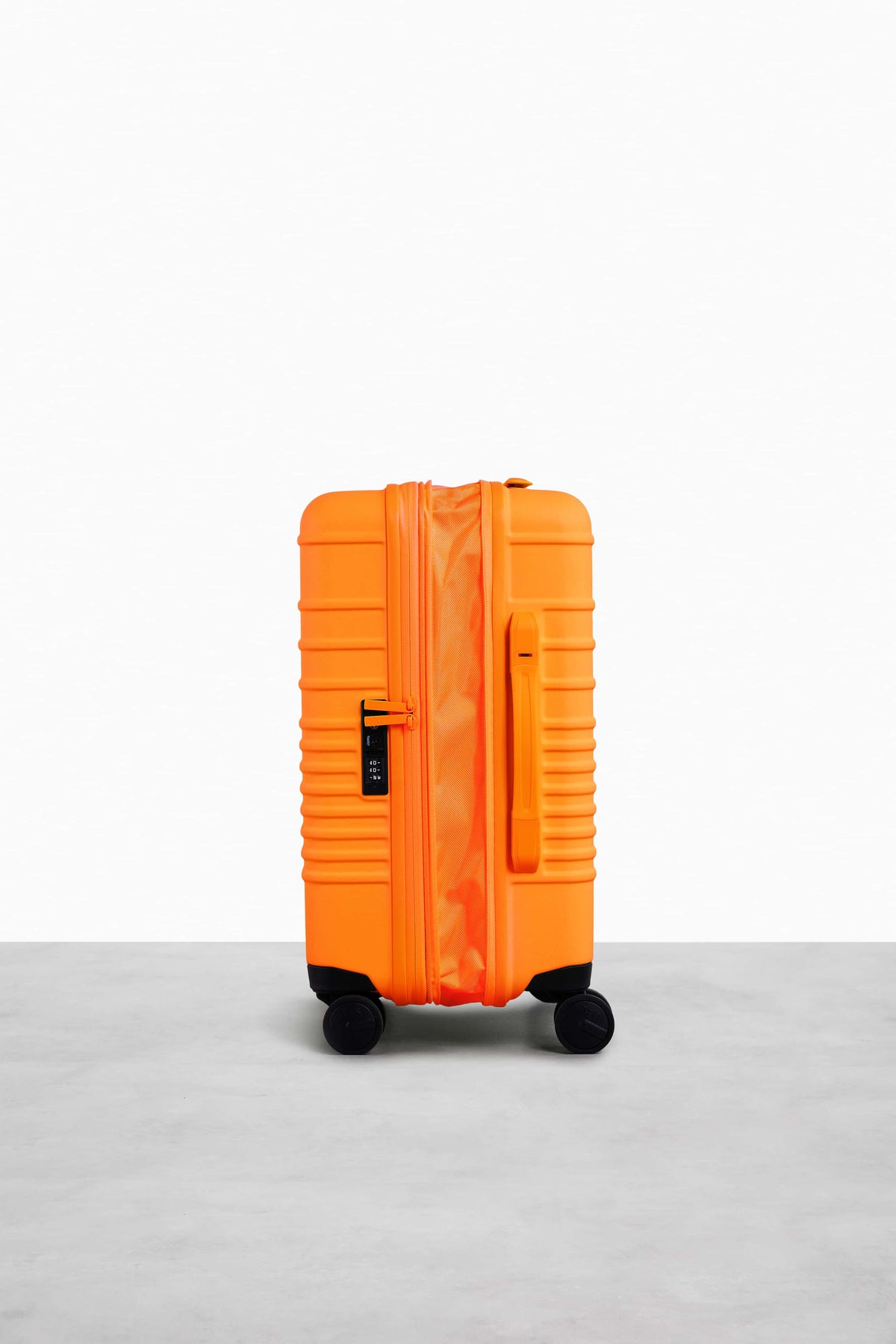 The Carry-On Roller in Creamsicle